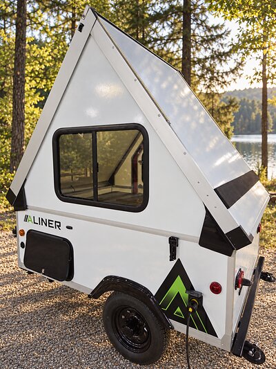 The Aliner Alite has returned—refreshed, reimagined and ready for the road ahead. Just 672 pounds, full interior height, and garageable convenience. The Aliner Alite has returned—refreshed, reimagined and ready for the road ahead. Just 672 pounds, full interior height, and garageable convenience.