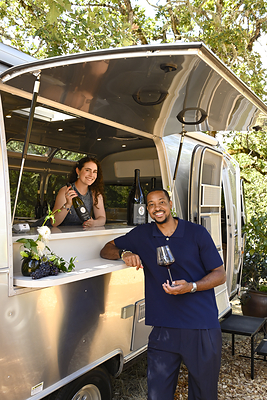 CJ and Elise McCollum with the vintage Airstream at their Carlton estate. Credit: Carolyn Wells-Kramer. CJ and Elise McCollum with the vintage Airstream at their Carlton estate. Credit: Carolyn Wells-Kramer.