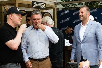 Jeremy Kasler, Steve Scheidecker and Jim Gaffigan share a bourbon pour at the BarrelPick.com booth during the 2026 Kentucky Bourbon Festival in Bardstown, Kentucky. BarrelPick.com officially launched its bourbon barrel ownership platform during the festival.