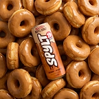 SPYLT Maple Donut protein milk surrounded by maple donuts