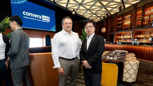 Patrick Gauthier, Group CEO of Convera with CEO of Just LogIn Kwa Kim Chiong. Patrick Gauthier, Group CEO of Convera with CEO of Just LogIn Kwa Kim Chiong.