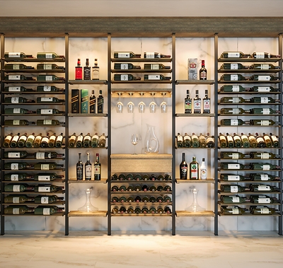 A floor-to-ceiling Somm Series installation combining wine and spirits storage, stemware and a tasting station — built on Kessick's newly patented concave pole system.