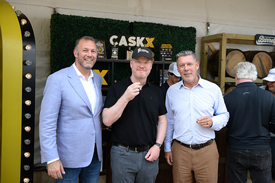 CaskX CEO Jeremy Kasler, Steve Scheidecker and comedian and bourbon enthusiast Jim Gaffigan share a pour at the CaskX Lounge during the 2026 Kentucky Bourbon Festival in Bardstown, Kentucky.