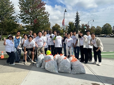 Family Federation and Partners for Beautification volunteers beautify Bridgeport SkyTrain Station in Richmond, British Columbia