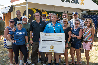 Paul Jones celebrates winning a 2026 Jackson Purchase Distillery bourbon barrel during the CaskX Barrel Competition at the 2026 Kentucky Bourbon Festival. CaskX CEO Jeremy Kasler joined Jackson Purchase Distillery representatives Nichole Beam and Andrew Newton for the winning spin on the World Famous CaskX Bourbon Wheel.