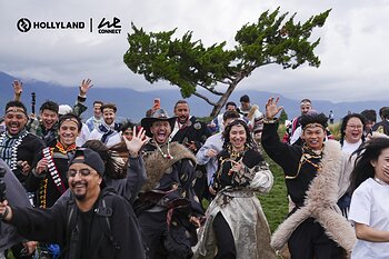 Creators in traditional ethnic attire enjoy the scenery and share memorable moments in Yunnan. This image opens in the lightbox