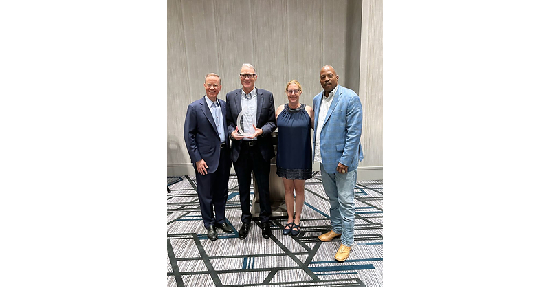 Caracal Presents John Reumann with Glen A. Taylor Excellence in Mentorship Award