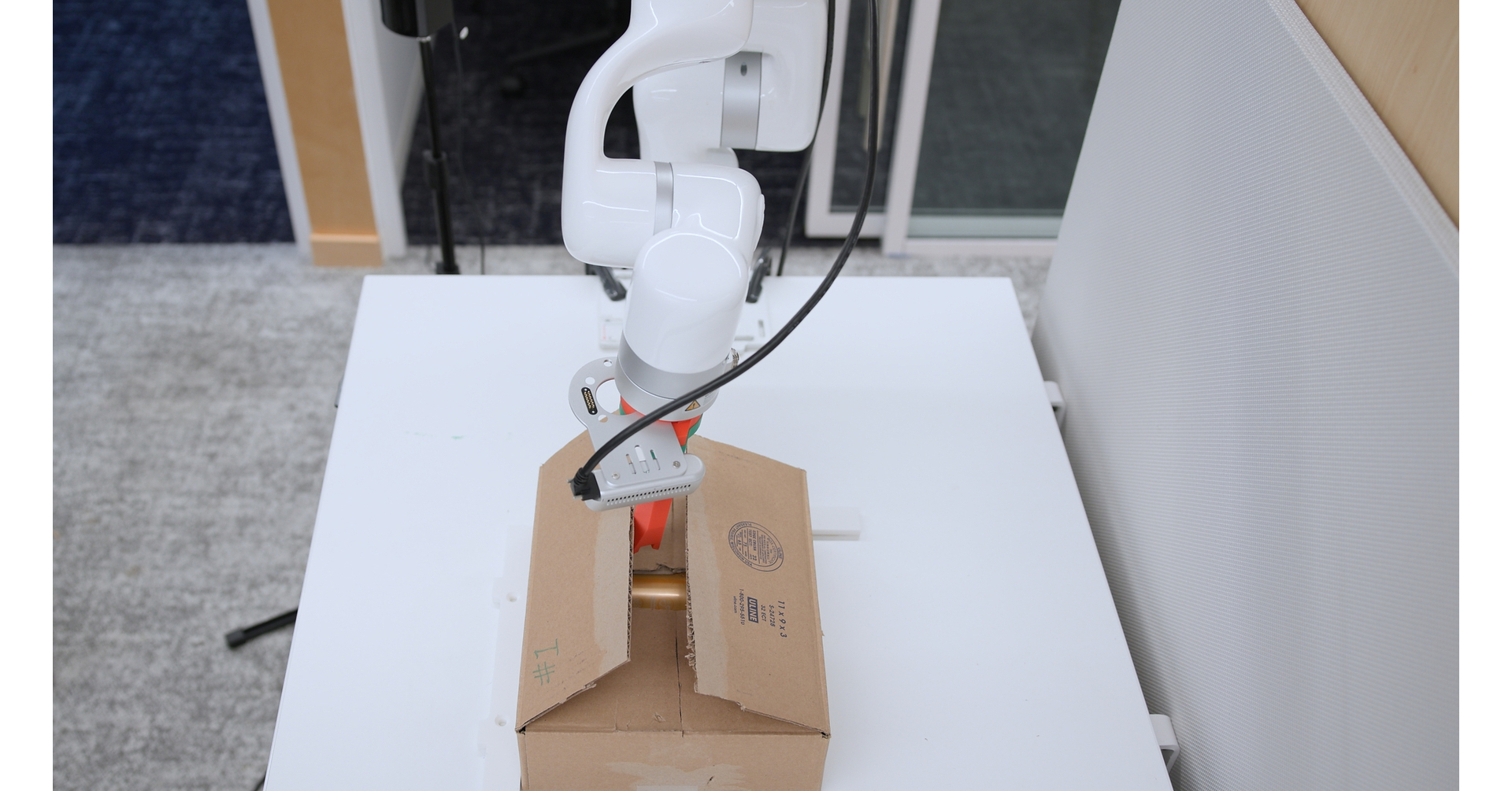 Viam Debuts Box-Opening Robot at IROS 2026