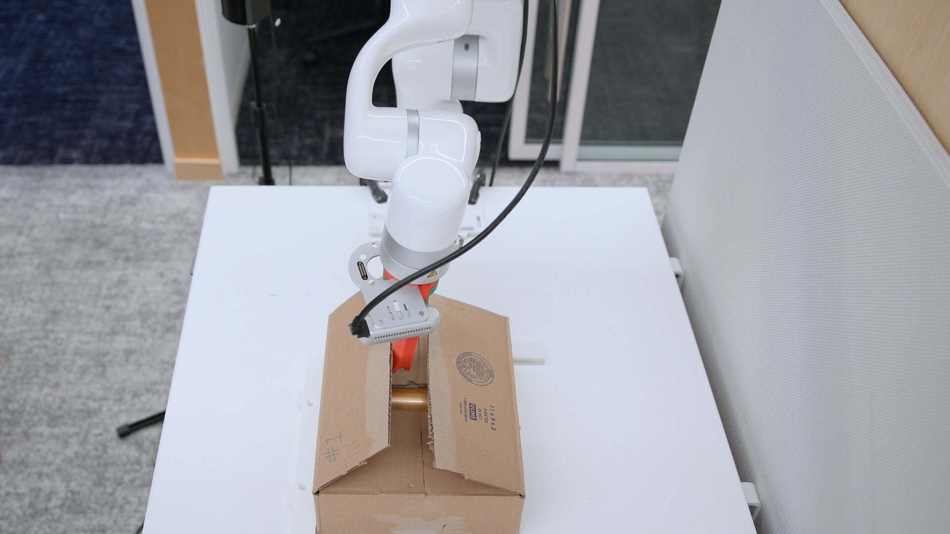 Viam Debuts Box-Opening Robot at IROS 2026