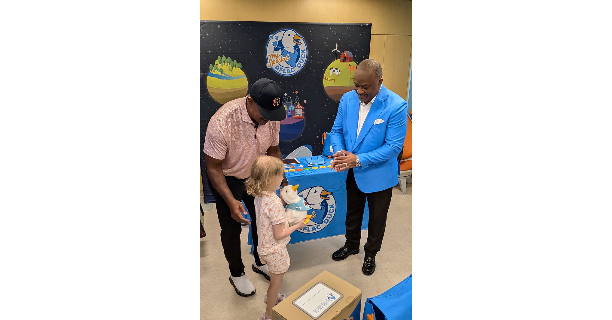 Former baseball and football star Brian Jordan and Aflac President Virgil Miller join forces to show love and care to children and families at SSM Health Cardinal Glennon Children's Hospital in St. Louis