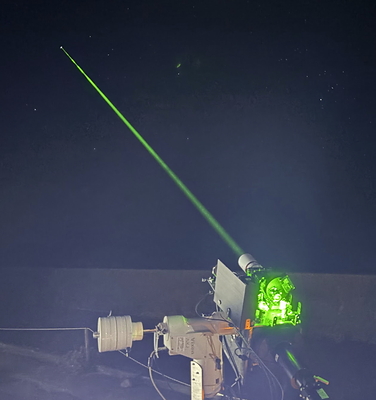 Transmitting laser pulses from the ground 