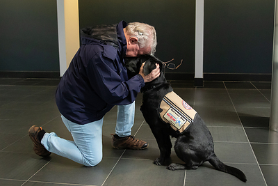 Heroes come in pairs: Service dogs offer independence and support for those who served.