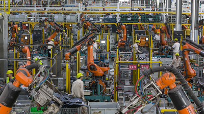 Industrial robots are operating at high speed in Zhejiang Province, China, September 3, 2026. /VCG