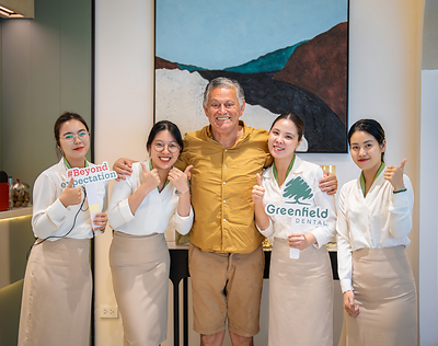 International patients with Greenfield Dental care team in the clinic lounge International patients with Greenfield Dental care team in the clinic lounge