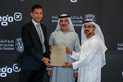 From left to right: Mamoun Hmidan, Chief Business Officer at Wego and Saleh Mohammed AlGeziry Director General, Tourism Sector; and Abdulla Yousuf Mohamed, Director, International Operations Department