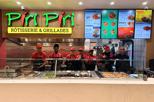 The Piri Piri team at the new Montréal Eaton Centre location in downtown Montreal.