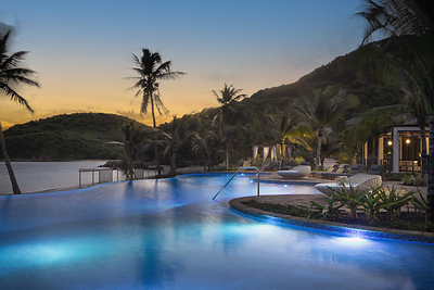 Poolside at Twilight on Deadman's Beach at Peter Island Resort