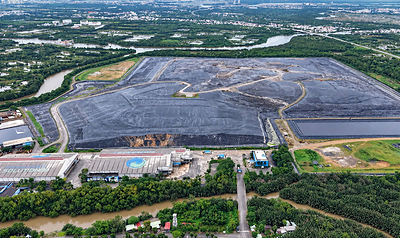 Aerial view of the Da Phuoc Integrated Waste Management Facility in Ho Chi Minh City. The large-scale integrated solid-waste facility is designed to receive up to 10,000 tons of municipal solid waste per day and is one of the principal treatment sites serving the city. Aerial view of the Da Phuoc Integrated Waste Management Facility in Ho Chi Minh City. The large-scale integrated solid-waste facility is designed to receive up to 10,000 tons of municipal solid waste per day and is one of the principal treatment sites serving the city.