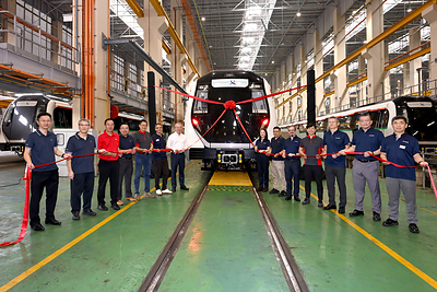 Representatives from the Land Transport Authority (LTA) Singapore,  SMRT Trains and Alstom at the final train handover ceremony.