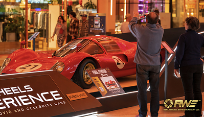 Reel Wheels at Formula 1 Las Vegas at Resorts World, showcasing iconic film and television vehicles in a high-traffic entertainment environment Reel Wheels at Formula 1 Las Vegas at Resorts World, showcasing iconic film and television vehicles in a high-traffic entertainment environment