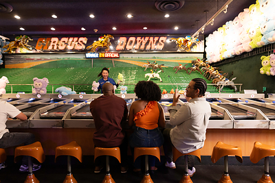 The Midway combines more than 200 arcade and carnival games with free daily circus acts, creating one of the Strip’s most distinctive multigenerational entertainment experiences.