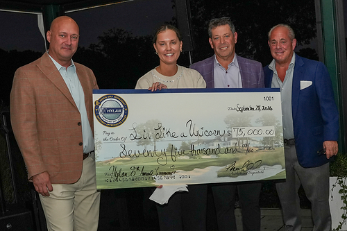 HYLAN presents a $75,000 check to Emma Lipnicky, Executive Director of Liv Like a Unicorn, during the evening reception of HYLAN’s 8th Annual Golf Tournament. HYLAN presents a $75,000 check to Emma Lipnicky, Executive Director of Liv Like a Unicorn, during the evening reception of HYLAN’s 8th Annual Golf Tournament.