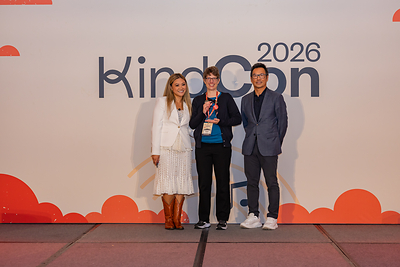 Heather Thorwald, University of Colorado, accepting 2026 Kindness Award from Kindsight's Marie Yatco and George Wu