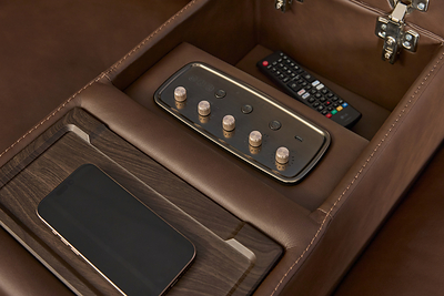 Flexsteel® Pulse™ features integrated audio controls, wireless charging, and hidden storage.