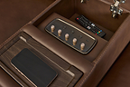Flexsteel® Pulse™ features integrated audio controls, wireless charging, and hidden storage.