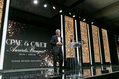 Manley Feinberg II accepts induction into the CPAE Speaker Hall of Fame® at the National Speakers Association's awards banquet, Austin, Texas, July 27, 2026.