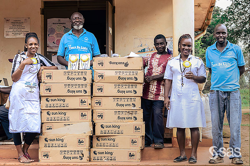 Let There Be Light International staff deliver solar lights to a clinic. Let There Be Light International staff deliver solar lights to a clinic.