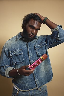 Will Anderson Jr. using Mielle’s Pomegranate and Honey Curl Defining Mousse. Will Anderson Jr. using Mielle’s Pomegranate and Honey Curl Defining Mousse.