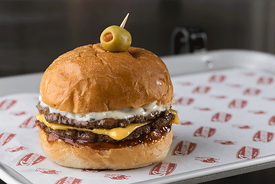 Guests can enjoy a Galley Boy with a signature pimento-stuffed green olive on top. Guests can enjoy a Galley Boy with a signature pimento-stuffed green olive on top.