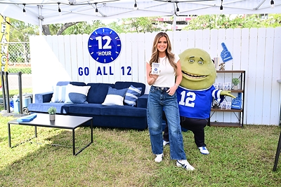 JoJo Fletcher and Mr. Mucus at Mucinex's Go All 12 Tailgate in Tampa, FL. JoJo Fletcher and Mr. Mucus at Mucinex's Go All 12 Tailgate in Tampa, FL.