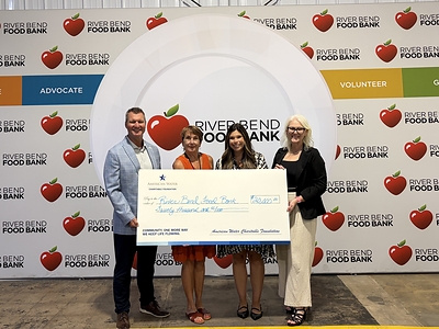 Iowa American Water President Brad Nielsen and External Affairs Manager Jackie Kleppe joined leaders from River Bend Food Bank to celebrate a $20,000 grant from the American Water Charitable Foundation. The funding helps advance the food bank's mission of addressing hunger and supporting individuals and families in the communities Iowa American Water proudly serves. Iowa American Water President Brad Nielsen and External Affairs Manager Jackie Kleppe joined leaders from River Bend Food Bank to celebrate a $20,000 grant from the American Water Charitable Foundation. The funding helps advance the food bank's mission of addressing hunger and supporting individuals and families in the communities Iowa American Water proudly serves.