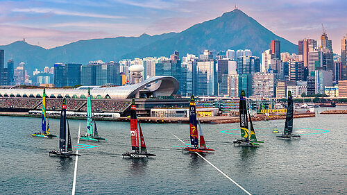 "Artist’s impression of SailGP’s F50 catamarans racing on Hong Kong’s iconic Victoria Harbour ahead of the inaugural American Express Hong Kong Sail Grand Prix on January 23–24, 2027. Disclaimer: Concept image for illustrative purposes only." This image opens in the lightbox