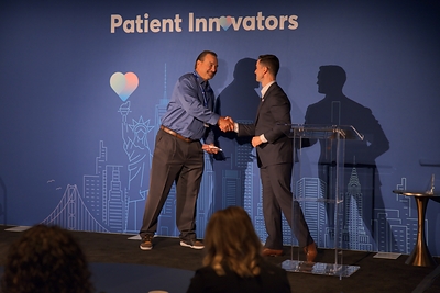 Danny Sigurdson, Founder and CEO of Courier Health, presents Rob Chuba of Alkermes with 2026 "Patient Champion of the Year." Danny Sigurdson, Founder and CEO of Courier Health, presents Rob Chuba of Alkermes with 2026 "Patient Champion of the Year."
