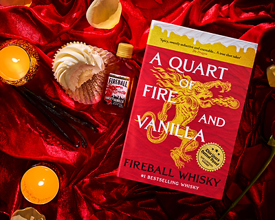 The limited-edition Fireball Vanilla Smut Stash book opens to reveal an original, steamy short story and a secret compartment for two 50mL shooters of the new Torch'd Vanilla flavor, proving that this vanilla is anything but boring. The limited-edition Fireball Vanilla Smut Stash book opens to reveal an original, steamy short story and a secret compartment for two 50mL shooters of the new Torch'd Vanilla flavor, proving that this vanilla is anything but boring.