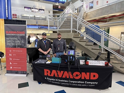 Raymond welding associates, Christopher Mowris (left) and Trevor Budine (right), demonstrate a welding simulator at Manufacturing Day Event. Photo Credit: SUNY Broom Raymond welding associates, Christopher Mowris (left) and Trevor Budine (right), demonstrate a welding simulator at Manufacturing Day Event. Photo Credit: SUNY Broom
