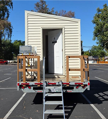 Figure 2 : Front view of small house on wheels Figure 2 : Front view of small house on wheels
