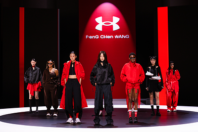 Models showcase the UA x Feng Chen Wang Rebel Daughter collection on stage during the launch event in Shanghai Models showcase the UA x Feng Chen Wang Rebel Daughter collection on stage during the launch event in Shanghai