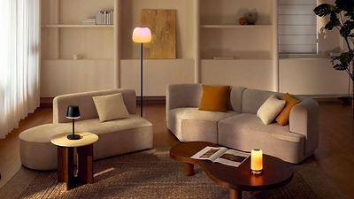 Layered lighting with multiple light sources creates a cosy atmosphere at home.