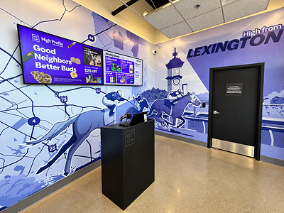 The check-in area at High Profile Cannabis Shop Lexington features a custom mural that celebrates the city’s horse racing heritage and maps the routes patients take across the region, including I-64, I-75 and New Circle Road. The store at 130 W. Tiverton Way near Fayette Mall is C3 Industries’ third Kentucky dispensary and serves registered medical cannabis patients and caregivers in-store, at the drive-thru and through online pre-ordering. The check-in area at High Profile Cannabis Shop Lexington features a custom mural that celebrates the city’s horse racing heritage and maps the routes patients take across the region, including I-64, I-75 and New Circle Road. The store at 130 W. Tiverton Way near Fayette Mall is C3 Industries’ third Kentucky dispensary and serves registered medical cannabis patients and caregivers in-store, at the drive-thru and through online pre-ordering.