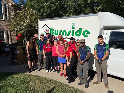 Feel The Love recipient with staff from Burnside Air Conditioning, Heating, and Plumbing in McKinney, Texas