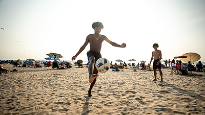 Visitors enjoying the beach.