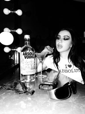 Charli xcx sips on an Absolut Vodka Extra Dirty Martini