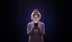 Image of older woman with a shield around her face indicating likeness protection