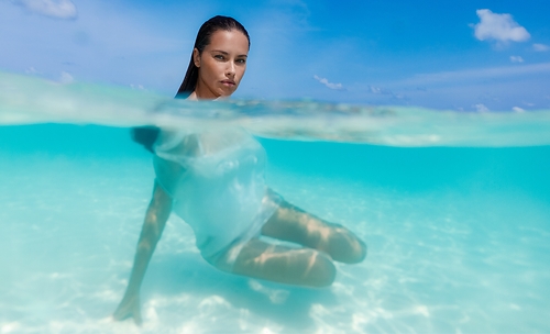 Adriana Lima shot by Russell James for Baccarat Residences Maldives. This image opens in the lightbox
