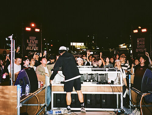 A crowd gathers for live music at Marshall's “LIVE FROM YEONNAM : HYUKOH” event in Seoul's Yeonnam-dong neighborhood, bringing artists, grassroots venues and local music communities together. This image opens in the lightbox