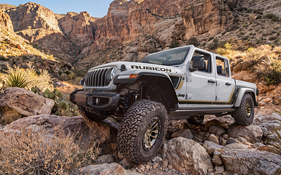 The new 2027 Jeep® Gladiator 35-inch Tire Launch Edition brings factory-installed 35-inch all-terrain tires to Willys, Rubicon and Rubicon X models for the first time, combining enhanced off-road capability with exclusive bronze accents and distinctive graphics.
